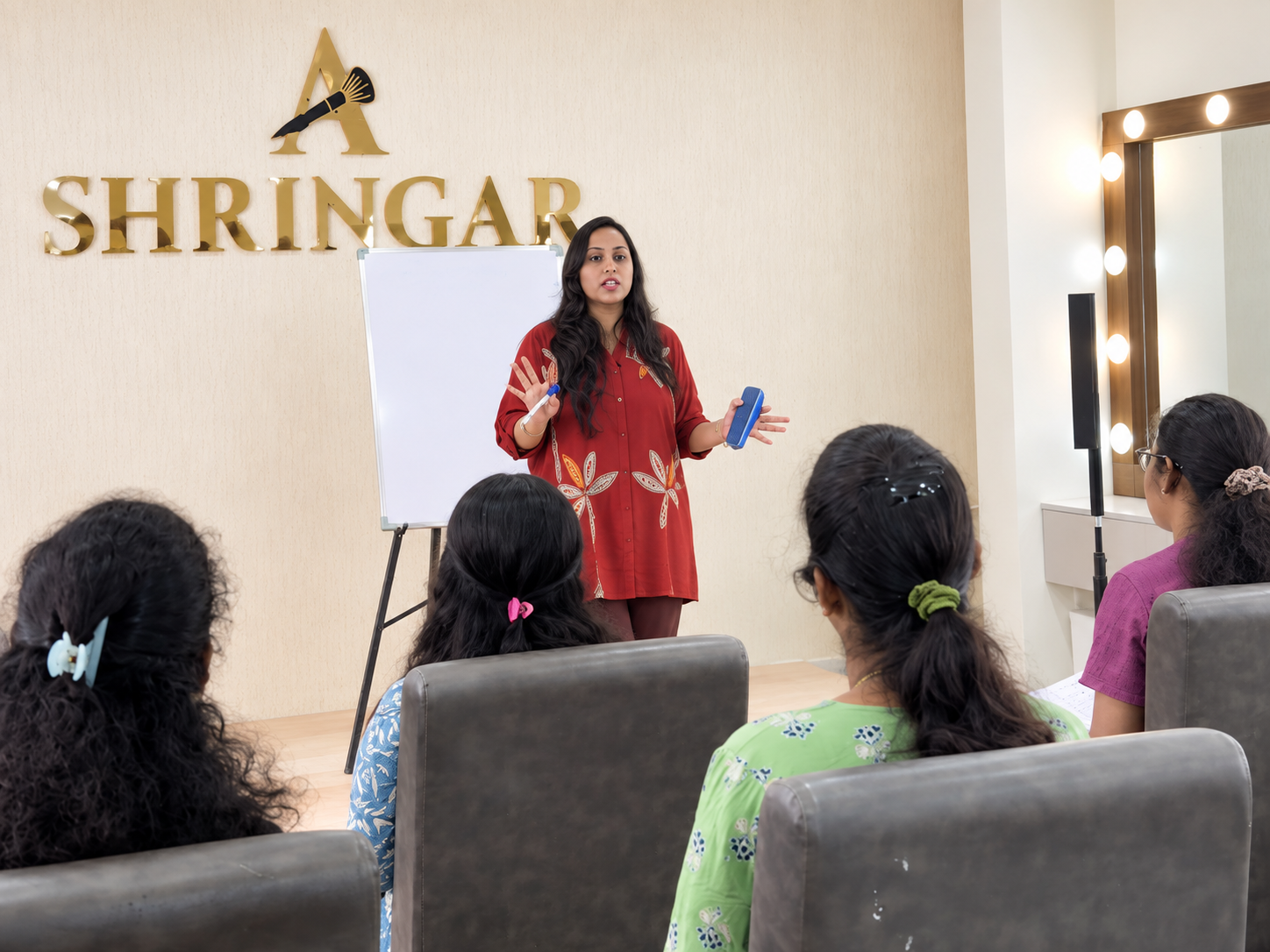 Shringar trainer guiding students in the academy classroom